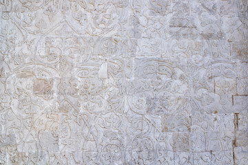 Carved white stone panels