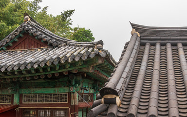 Naklejka premium Inside Korean Buddhistic Temple Beomeosa on a foggy day. Located in Geumjeong, Busan, South Korea, Asia.