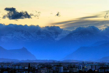 View of Turin (Torino) Italy at sunset looking toward Susa Valley with the backdrop of the Italian...