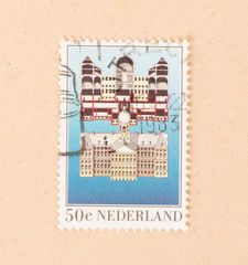 THE NETHERLANDS 1983: A stamp printed in the Netherlands shows a building, circa 1983