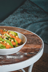 Delicious vegeterian tapas dish with fried carrots wrapped in lettuce