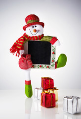 Snowman doll and gift