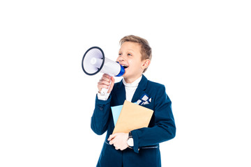 Fototapeta na wymiar happy schoolboy with books shouting in mouthpiece Isolated On White