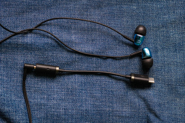 Headphones and Adapter USB type-C. Background for advertising