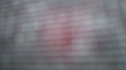 Background with abstract pattern: Defocused Gray Red Dots in Blurred Texture