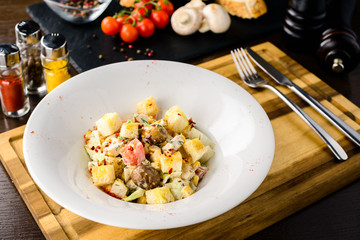 Vegetarian salad with mushrooms, cabbage and croutons