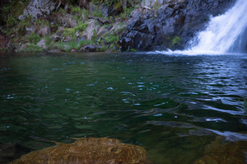 Waterfall in Manteigas, Serra da Estrela in Portugal called Poco do Inferno (Hell Pit)