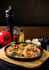 pan with roasted meat and vegetables