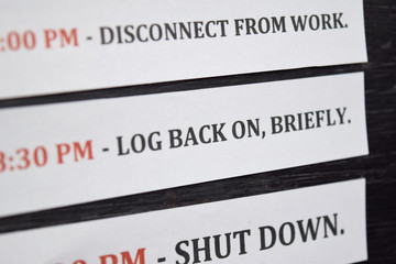 Close up making agenda Daily schedule on personal organizer. Business and entrepreneur concept. Isolated on black background