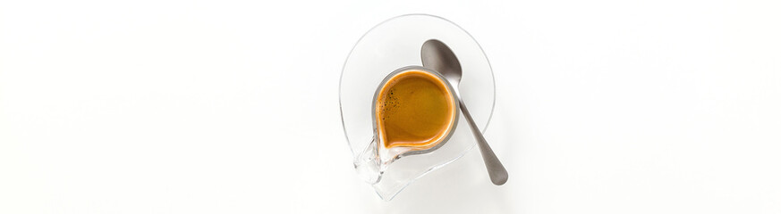 banner of Italian espresso coffee in glass cup isolated on white background. copy space