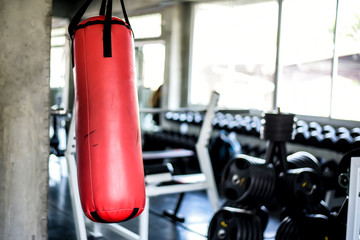 Close up boxing bags in sport gym