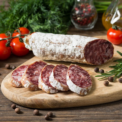 Sausage on a wooden Board in a rustic style