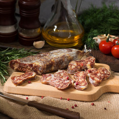Sausage on a wooden Board in a rustic style