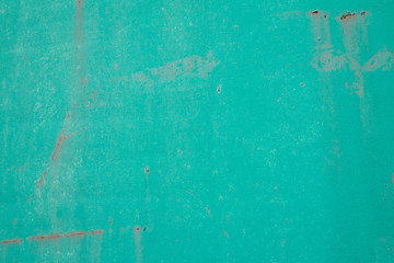 A rusty metallic dirty corroded turquoise green aquamarine background wall for text and food. Abstract texture conceptual grunge iron for design and decoration