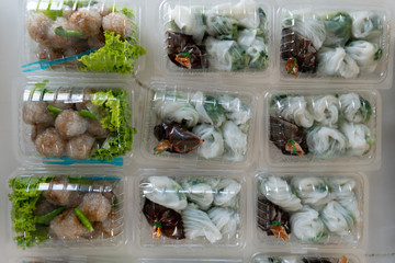 Gui Chai or Garlic chives and Tapioca pork or Sa-Ku Sai Muu candy Thailand in plastic box.