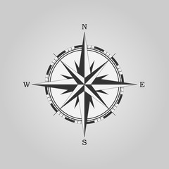 Compass rose, wind rose, navigation icon isolated on gray background. Vector illustration, flat design.