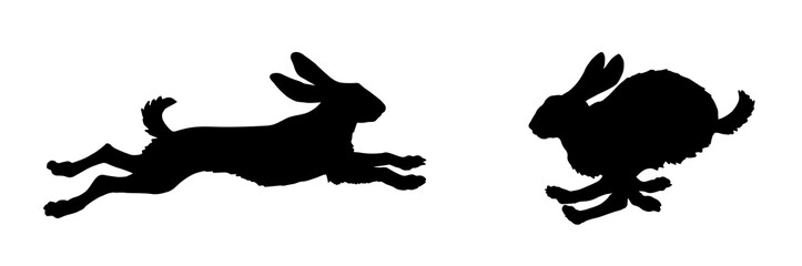 black isolated silhouettes of galloping hares on white background,