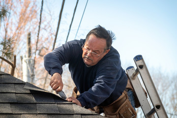 60 years old roofer working
