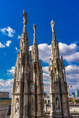 Fototapeta na wymiar Rooftop terraces of Milan Duomo in Italy