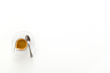 Italian espresso coffee in glass cup isolated on white background. copy space
