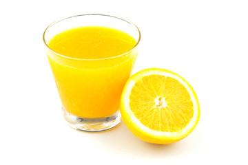 Yellow flesh navel orange fruits and juice in glass isolated on white background