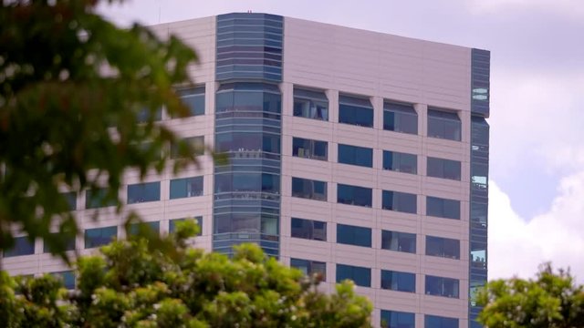 TOP FLOORS OF THE COPORATION, ESTABLISHING SHOT.  LOCK-OFF IN 4K, 10 BIT.