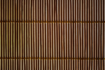 Bamboo blinds and sunlight bursting through them