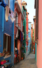Fototapeta na wymiar narrow street called CALLE in Italian Language in the island of