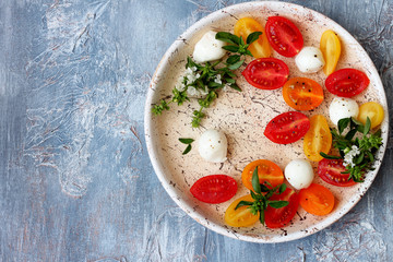 Mozzarella, cherry tomatoes and basil.Caprese salad 