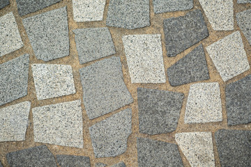 Fototapeta premium Rough stone wall texture for background or wallpaper.