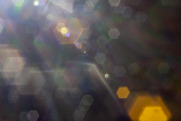 abstracts lens flare effect background with hexagon parttern