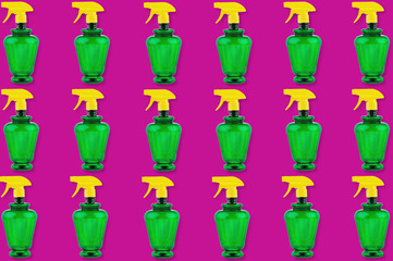 Horizontal rows of plastic sprayers on pink background. Seamless pattern