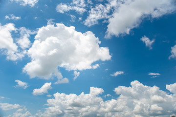 Bright ans white clouds on blue sky in summer