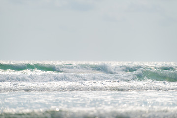 Selective focus sea water and splash with daylight