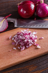 red onion cut on a wooden board