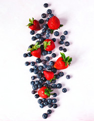 Strawberries and blueberries, top view