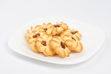  cookies on plate isolated on white