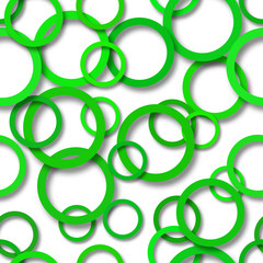 Abstract seamless pattern of randomly arranged green rings with soft shadows on white background