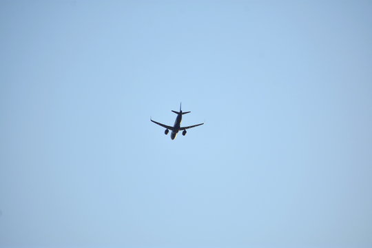Travel image - Air plane in blue sky with copy space - minimalism concept