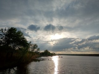 Fototapeta na wymiar Beautiful sunset on a calm river