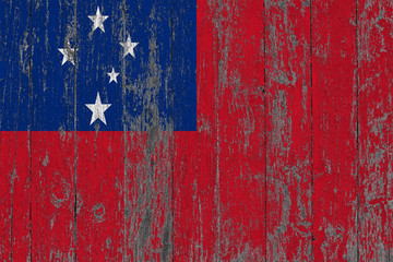 Flag of Samoa painted on worn out wooden texture background.