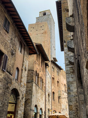 Fototapeta na wymiar San Gimignano, an Italian medieval village with characteristic stone towers.