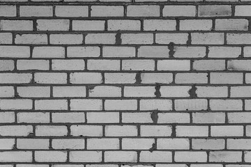 Texture, brick, wall, it can be used as a background . Brick texture with scratches and cracks