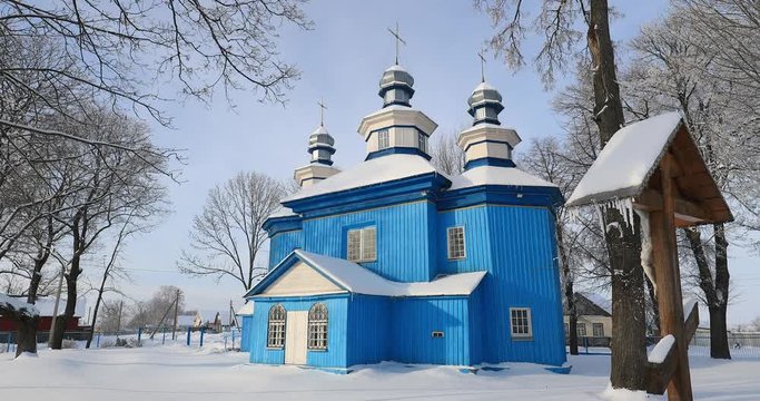 Staraya Belitsa, (Uritskiy Sel'sovet), Gomel Region, Belarus. Old Wooden Orthodox Church Of St Nicholas The Wonderworker At Sunny Winter Day. Orthodox Church Of St. Nikolaya Chudotvortsa