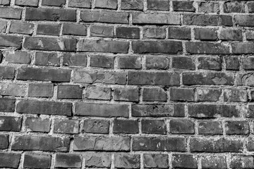 Texture, brick, wall, it can be used as a background . Brick texture with scratches and cracks