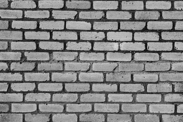Texture, brick, wall, it can be used as a background . Brick texture with scratches and cracks