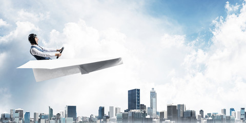 Business motivation concept with pilot airplane