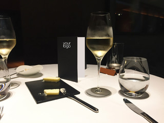 Luxury Restaurant Table with Glass with Fresh White Wine and Butter, Portuguese luxury restaurant table.
