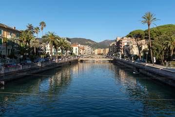 Fototapeta na wymiar River channel at centre of Rapallo town, Italy