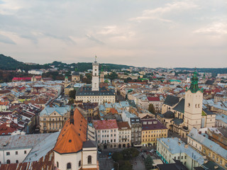 Obraz premium aerial view old european city with red roofs
